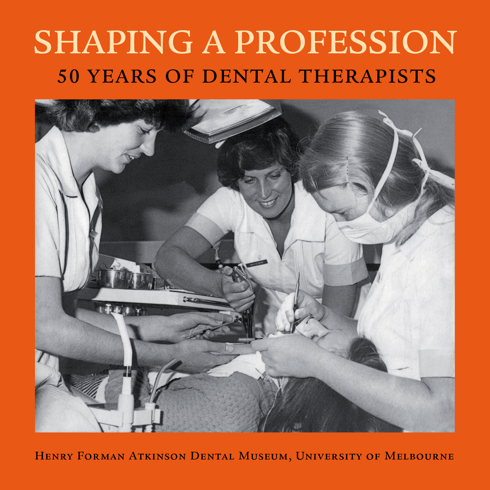 Second‑year dental therapy students Maureen Hahn and Christine Hill with dental assistant, 1977, photograph.